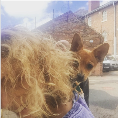 Picture of Myanna Buring with her dog